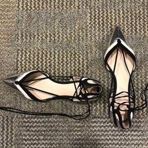 Pointed toe flats with laces